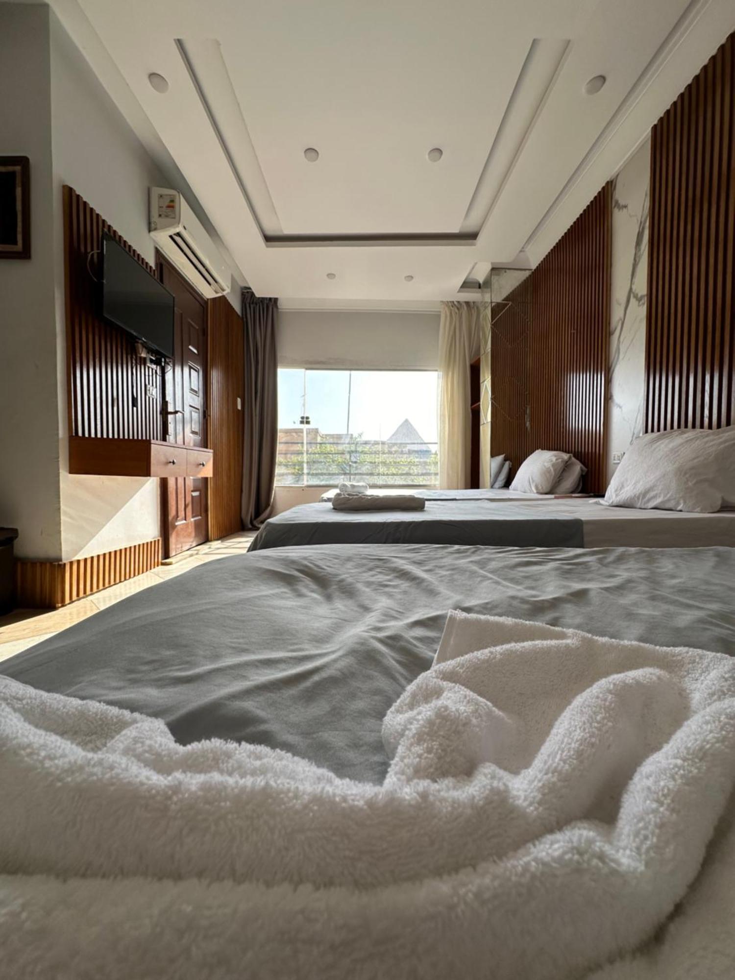 Pyramids Family Inn Kafrat al Jabal Экстерьер фото