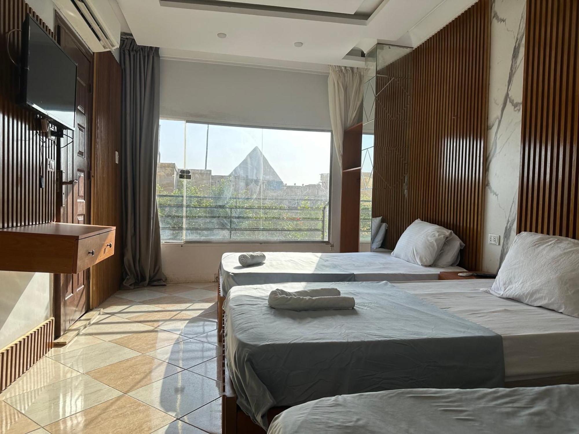 Pyramids Family Inn Kafrat al Jabal Экстерьер фото